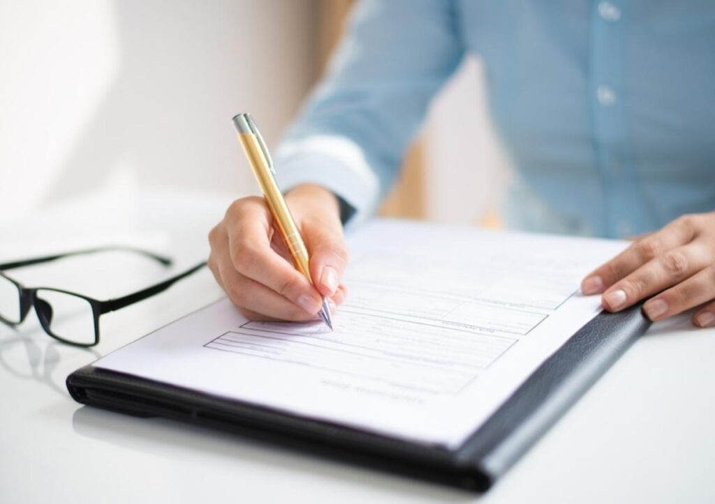 Closeup of business woman checking documents