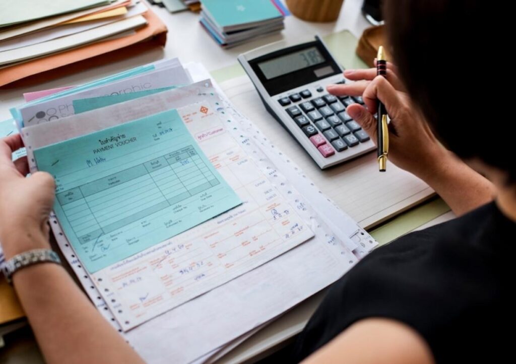 woman working through paperwork