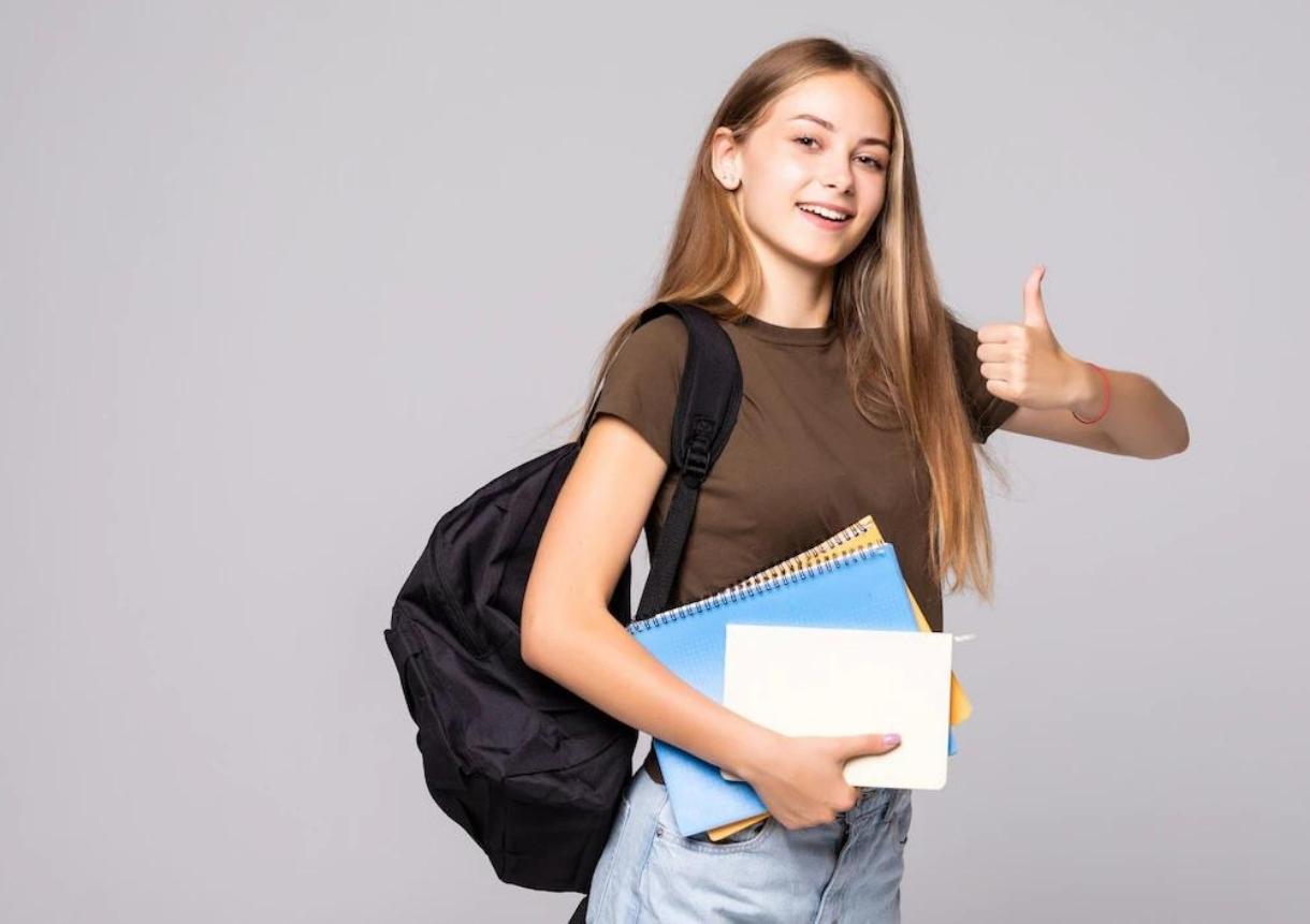 Young student woman with backpack bag
