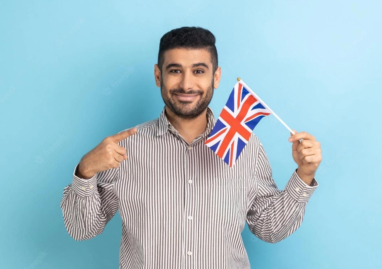 man holding british flag