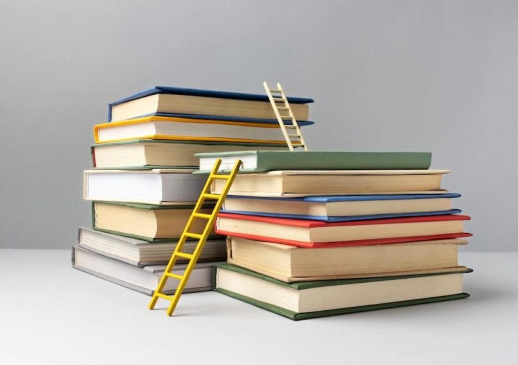 Front view of stacked books and ladders