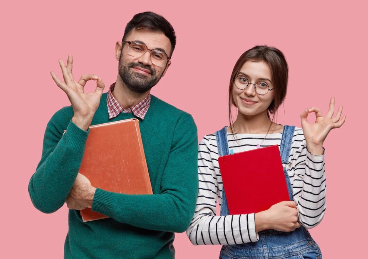 male student and his female groupmate demonstrates okay gesture